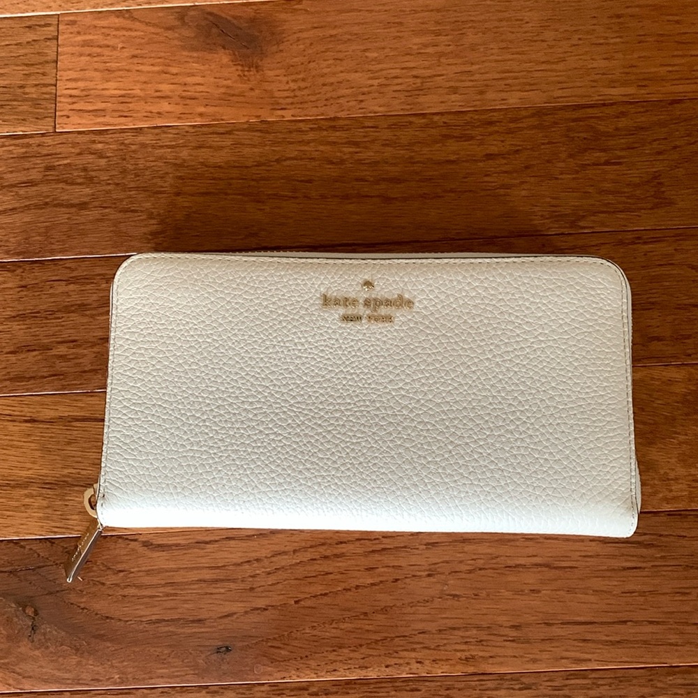 Kate Spade zip around continental wallet. New without tags